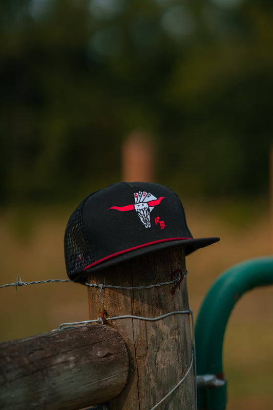 “The Rowdy Gambler” in black.
